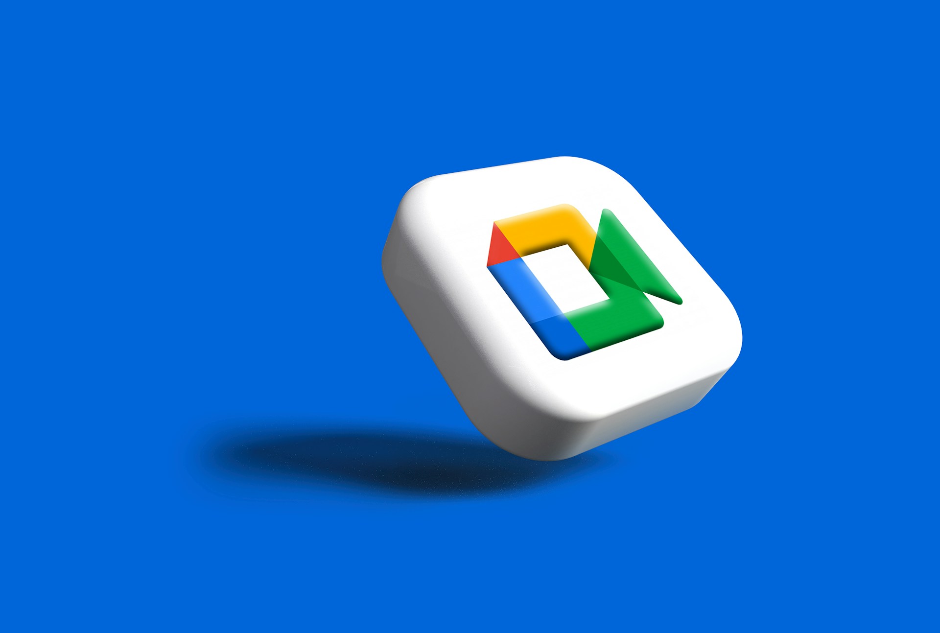 Google Meet logo on a bent white box on a blue background